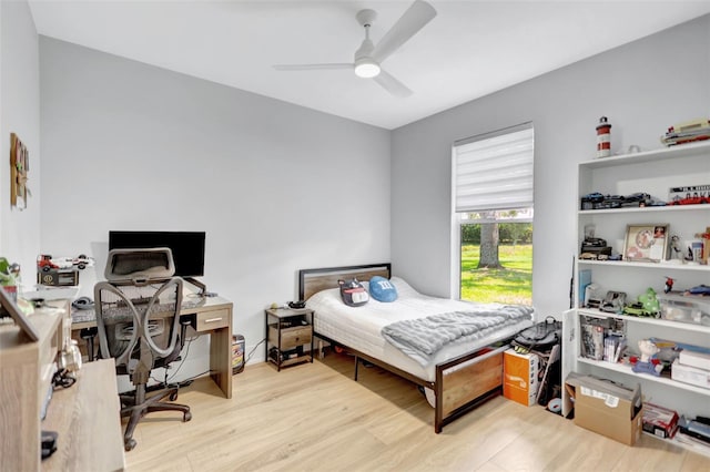 5285 Far Oak Cir, Sarasota, FL 34238 - bedroom with wood finished floors, a desk, and ceiling fan