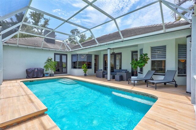 5285 Far Oak Cir, Sarasota, FL 34238 - swimming pool with an outdoor hangout area, french doors, a lanai, and a patio