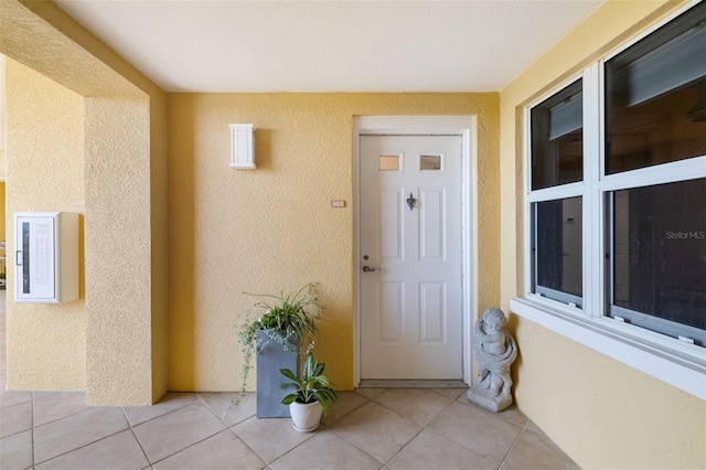 610 Riviera Dunes Way Unit 503, Palmetto, FL 34221 - view of exterior entry featuring stucco siding