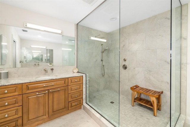 610 Riviera Dunes Way Unit 503, Palmetto, FL 34221 - bathroom featuring walk in shower and vanity