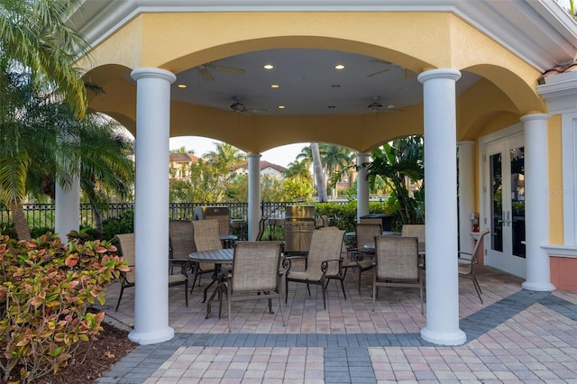 610 Riviera Dunes Way Unit 503, Palmetto, FL 34221 - view of patio with french doors, outdoor dining area, and a ceiling fan