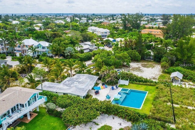 102 77th St, Holmes Beach, FL 34217 - aerial perspective of suburban area with a pool area