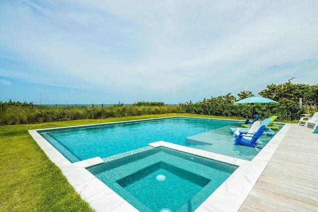 102 77th St, Holmes Beach, FL 34217 - view of pool featuring a pool with connected hot tub and a yard
