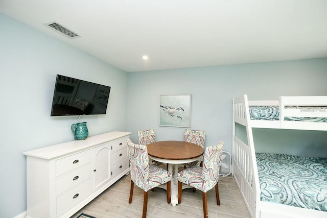102 77th St, Holmes Beach, FL 34217 - dining room with light wood finished floors, recessed lighting, and baseboards