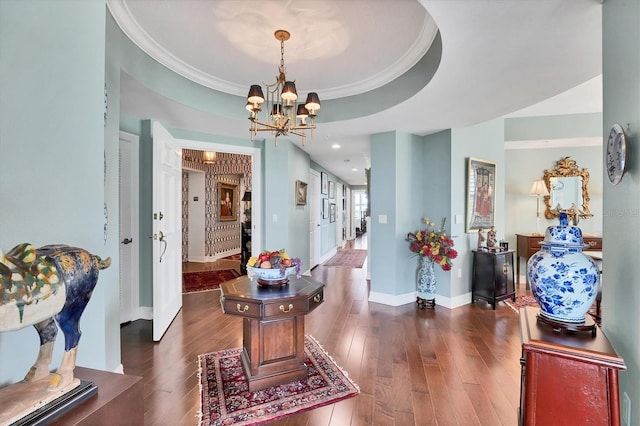 401 N Point Rd Unit 504, Osprey, FL 34229 - entrance foyer featuring a chandelier, dark wood finished floors, baseboards, recessed lighting, and crown molding
