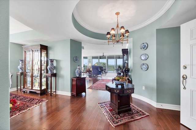 401 N Point Rd Unit 504, Osprey, FL 34229 - entryway with a chandelier, hardwood / wood-style flooring, baseboards, and ornamental molding