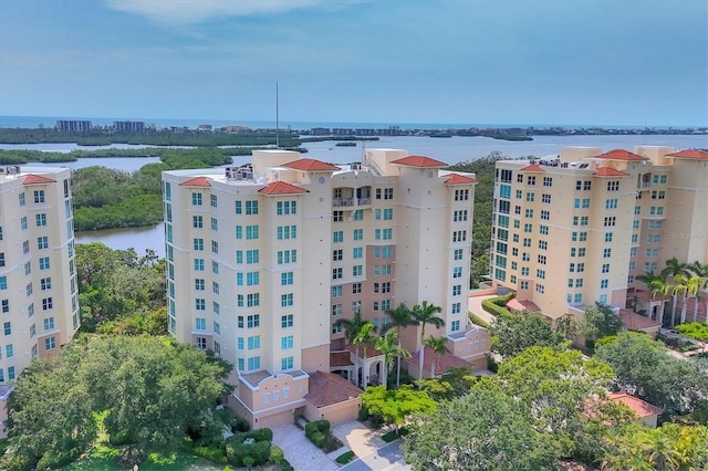 401 N Point Rd Unit 504, Osprey, FL 34229 - view of apartment building / complex featuring a water view