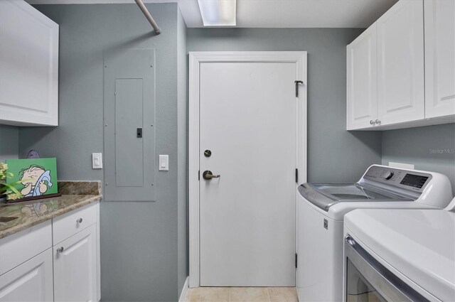 401 N Point Rd Unit 504, Osprey, FL 34229 - laundry room with cabinet space, independent washer and dryer, and electric panel