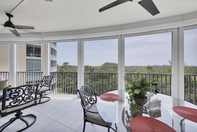 401 N Point Rd Unit 504, Osprey, FL 34229 - sunroom with tile patterned floors
