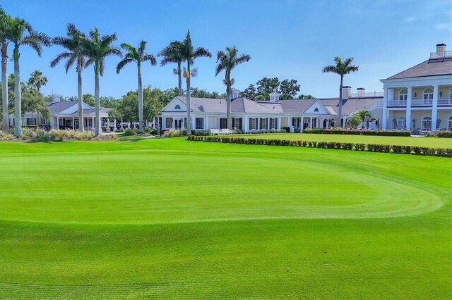 401 N Point Rd Unit 504, Osprey, FL 34229 - view of home's community featuring golf course view and a yard
