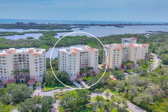 401 N Point Rd Unit 504, Osprey, FL 34229 - drone / aerial view of a large body of water and apartment complex