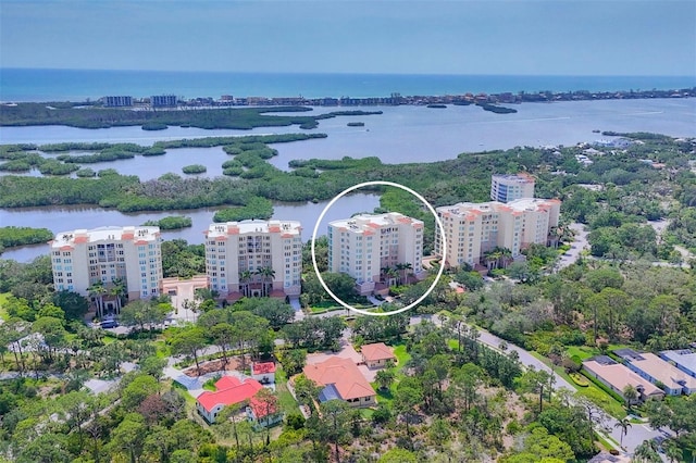 401 N Point Rd Unit 504, Osprey, FL 34229 - drone / aerial view of a large body of water and apartment complex