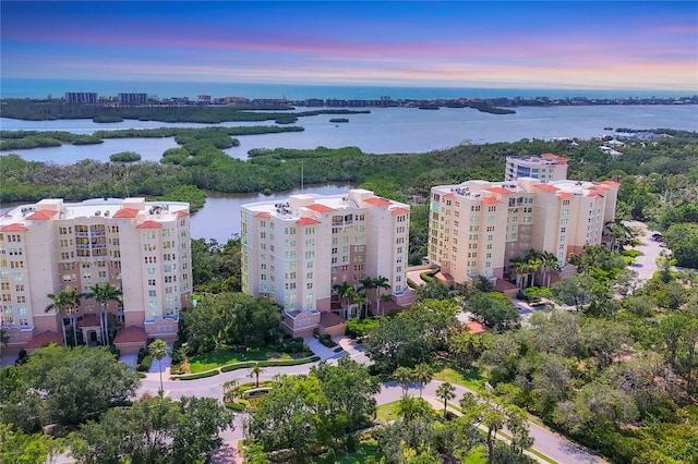 401 N Point Rd Unit 504, Osprey, FL 34229 - aerial view at dusk of a water view