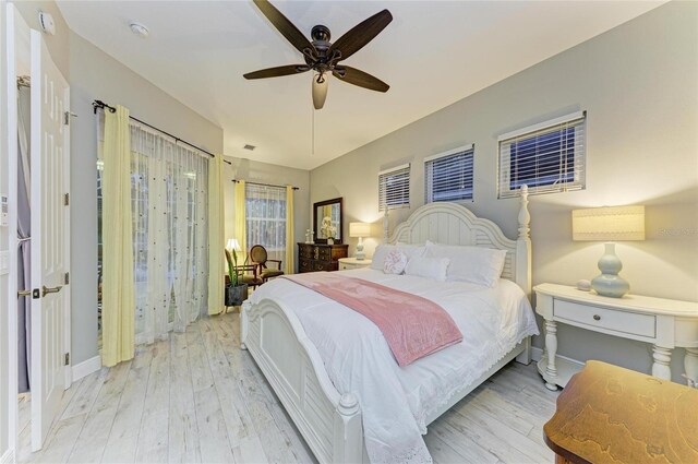 12175 Maple Ridge Dr, Parrish, FL 34219 - bedroom featuring wood finished floors and ceiling fan