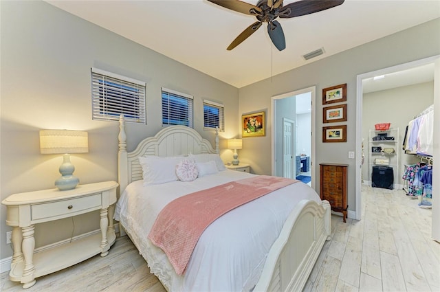 12175 Maple Ridge Dr, Parrish, FL 34219 - bedroom with light wood-style flooring and ceiling fan