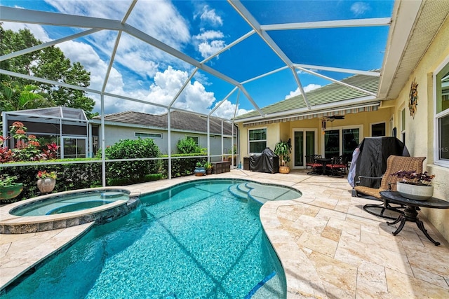 12175 Maple Ridge Dr, Parrish, FL 34219 - view of swimming pool with a patio area, a pool with connected hot tub, and a lanai
