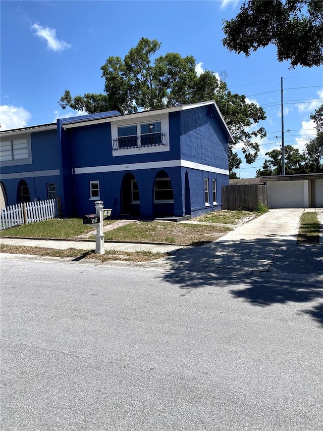 1947 Los Lomas Dr, Clearwater, FL 33763 - view of front of property with stucco siding and driveway