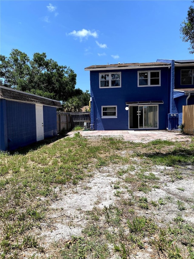 1947 Los Lomas Dr, Clearwater, FL 33763 - rear view of house featuring a patio area