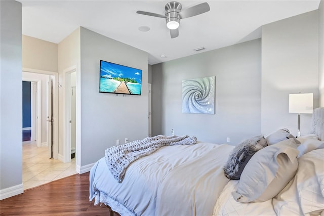 15006 21st Ave E, Bradenton, FL 34212 - bedroom featuring wood finished floors, a ceiling fan, and baseboards