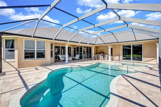 15006 21st Ave E, Bradenton, FL 34212 - view of swimming pool featuring a patio area, a pool with connected hot tub, an outdoor hangout area, and a lanai