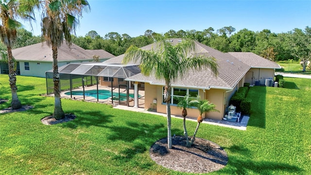 15006 21st Ave E, Bradenton, FL 34212 - back of property featuring a patio area, stucco siding, a yard, and an outdoor pool