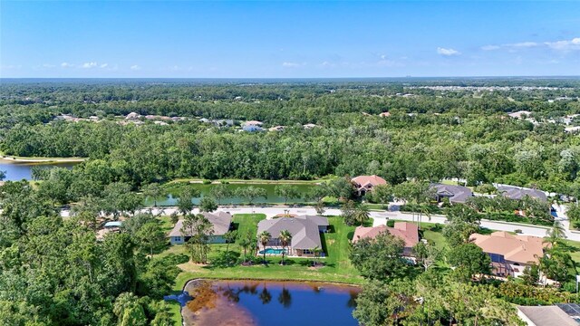 15006 21st Ave E, Bradenton, FL 34212 - aerial view of property's location with a heavily wooded area and a nearby body of water