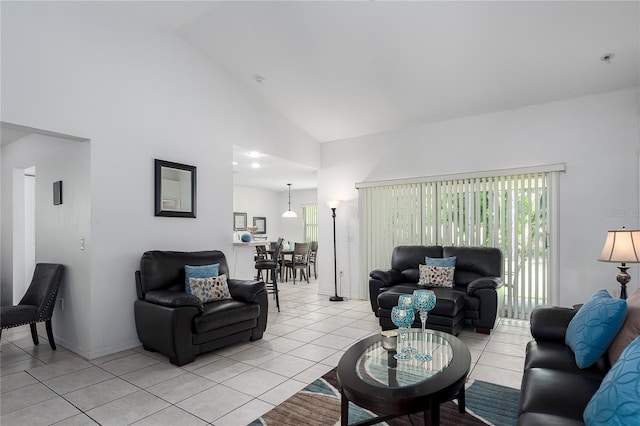 4811 69th Ct E, Palmetto, FL 34221 - living room with high vaulted ceiling and light tile patterned floors