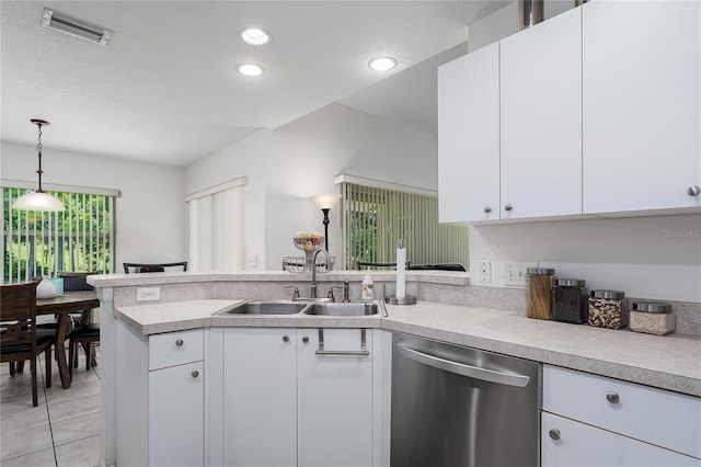 4811 69th Ct E, Palmetto, FL 34221 - kitchen featuring dishwasher, light countertops, a peninsula, white cabinetry, and recessed lighting