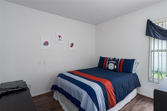 4811 69th Ct E, Palmetto, FL 34221 - bedroom with wood finished floors and baseboards
