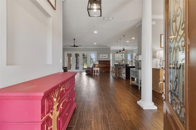 2350 Virgil Hall Rd, Lithia, FL 33547 - foyer entrance with decorative columns, ornamental molding, french doors, dark wood-type flooring, and recessed lighting