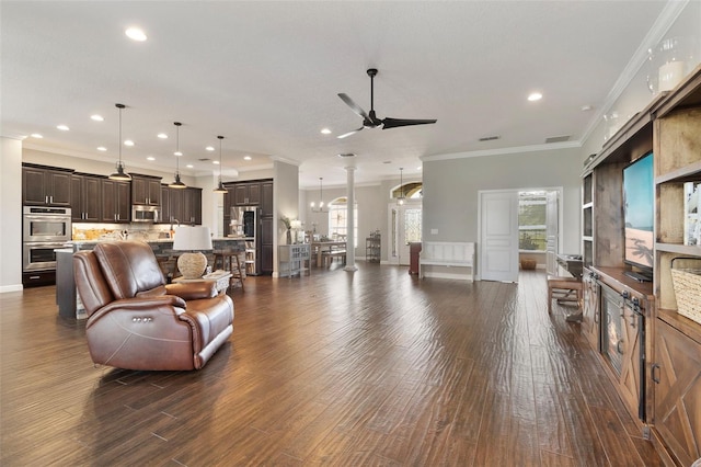 2350 Virgil Hall Rd, Lithia, FL 33547 - living area with a ceiling fan, ornamental molding, recessed lighting, dark wood-style floors, and a chandelier