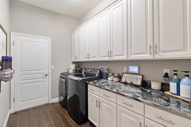 2350 Virgil Hall Rd, Lithia, FL 33547 - laundry area with cabinet space, washer and dryer, baseboards, and wood finish floors