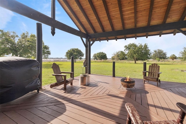 2350 Virgil Hall Rd, Lithia, FL 33547 - wooden terrace with an outdoor fire pit, a lawn, and area for grilling