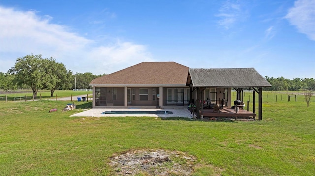 2350 Virgil Hall Rd, Lithia, FL 33547 - rear view of house featuring a sunroom, a wooden deck, and roof with shingles