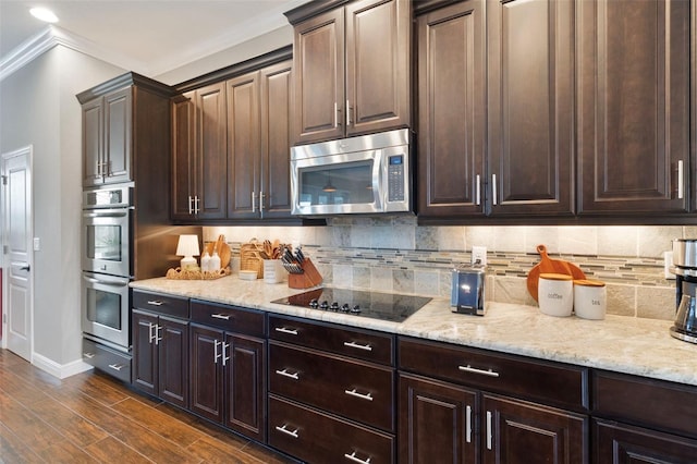 2350 Virgil Hall Rd, Lithia, FL 33547 - kitchen with appliances with stainless steel finishes, baseboards, tasteful backsplash, dark brown cabinets, and light stone counters