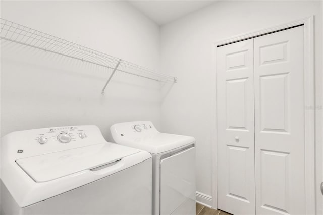 5213 Patano Loop, Palmetto, FL 34221 - laundry room with independent washer and dryer