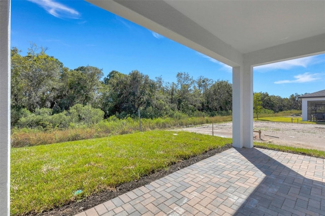5213 Patano Loop, Palmetto, FL 34221 - view of green lawn featuring a patio area