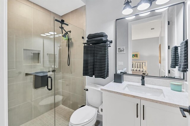 8020 Clearwater Ct, Sarasota, FL 34241 - full bathroom with vanity, toilet, and a shower stall