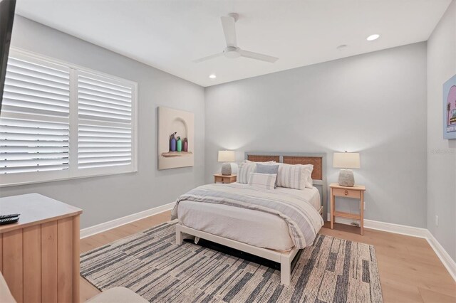 8020 Clearwater Ct, Sarasota, FL 34241 - bedroom featuring light wood finished floors, baseboards, ceiling fan, and recessed lighting