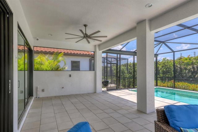 8020 Clearwater Ct, Sarasota, FL 34241 - view of patio / terrace featuring a ceiling fan, an outdoor pool, and glass enclosure