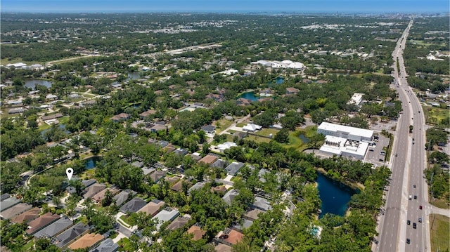 135 Tall Trees Ct, Sarasota, FL 34232 - aerial overview of property's location featuring a main thoroughfare, a nearby body of water, and nearby suburban area