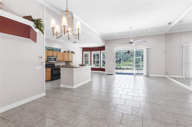 135 Tall Trees Ct, Sarasota, FL 34232 - kitchen featuring black / electric stove, stainless steel microwave, open floor plan, ornamental molding, and a sink