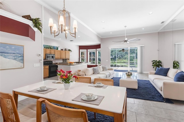 135 Tall Trees Ct, Sarasota, FL 34232 - living area featuring light tile patterned floors, recessed lighting, a chandelier, crown molding, and a ceiling fan