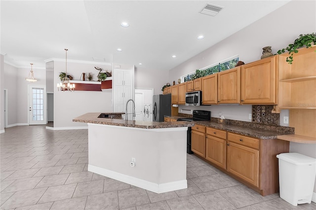135 Tall Trees Ct, Sarasota, FL 34232 - kitchen with open shelves, stainless steel microwave, black electric range oven, freestanding refrigerator, and light tile patterned floors