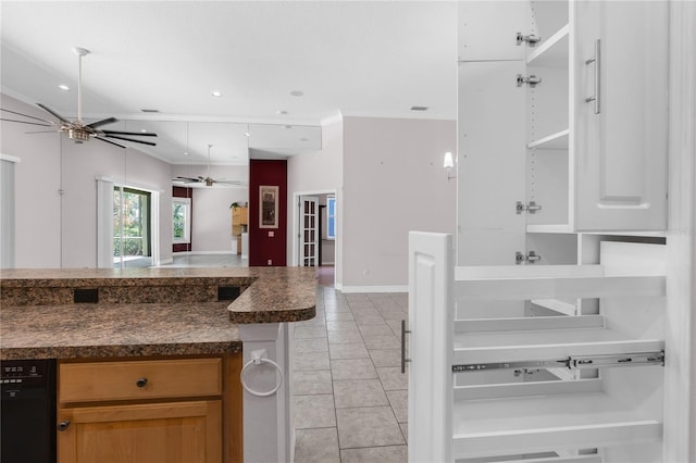 135 Tall Trees Ct, Sarasota, FL 34232 - kitchen with dark countertops, ceiling fan, light tile patterned floors, black dishwasher, and open floor plan