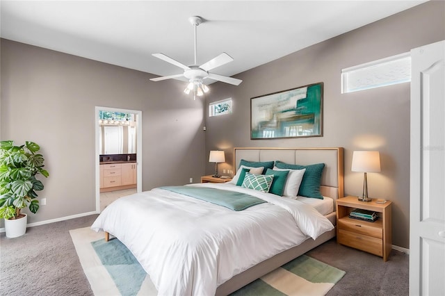 135 Tall Trees Ct, Sarasota, FL 34232 - carpeted bedroom featuring baseboards and connected bathroom