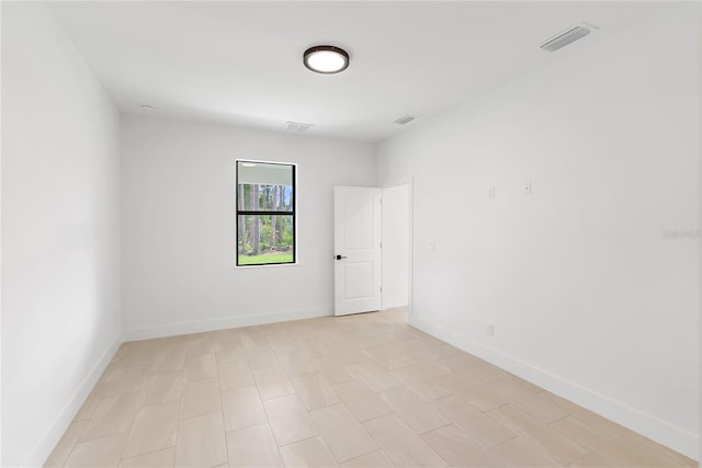 2638 Hagerick Ln, North Port, FL 34288 - spare room featuring baseboards