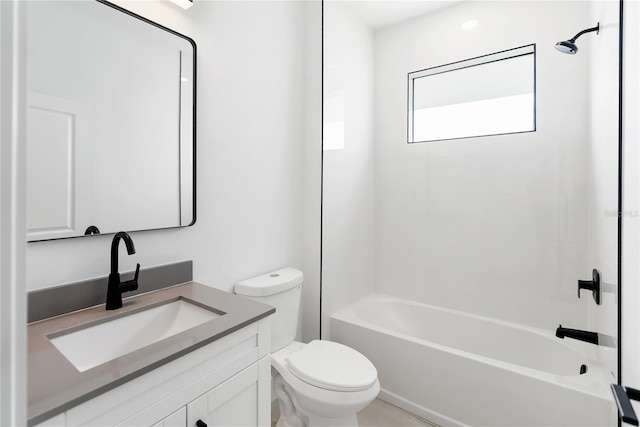 2638 Hagerick Ln, North Port, FL 34288 - full bathroom with vanity, toilet, and bathtub / shower combination