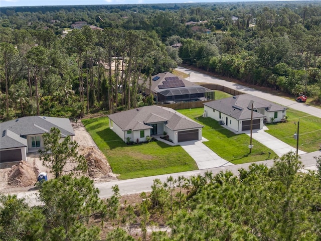 2638 Hagerick Ln, North Port, FL 34288 - view from above of property with a forest