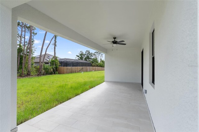 2638 Hagerick Ln, North Port, FL 34288 - view of patio featuring a ceiling fan